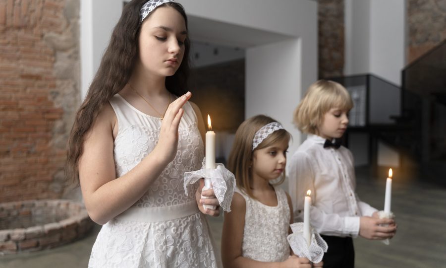 medium-shot-kids-praying-with-candles